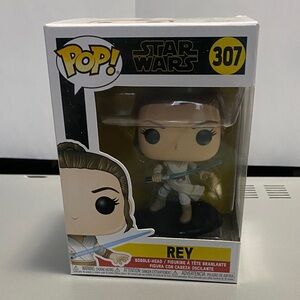 Funko #307 Star Wars Rey Figure with Blue and White Accents